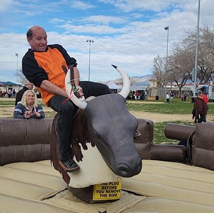 Mechanical bull rental set up at a Pahrump birthday party